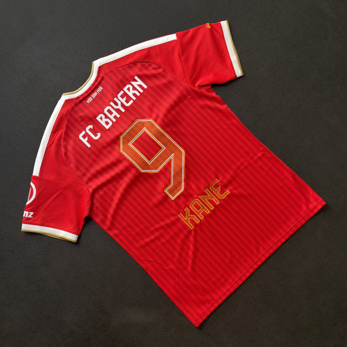 Bayern Munich 26/27 home jersey with Harry Kane's 9 and nameset embroidered in gold, back view