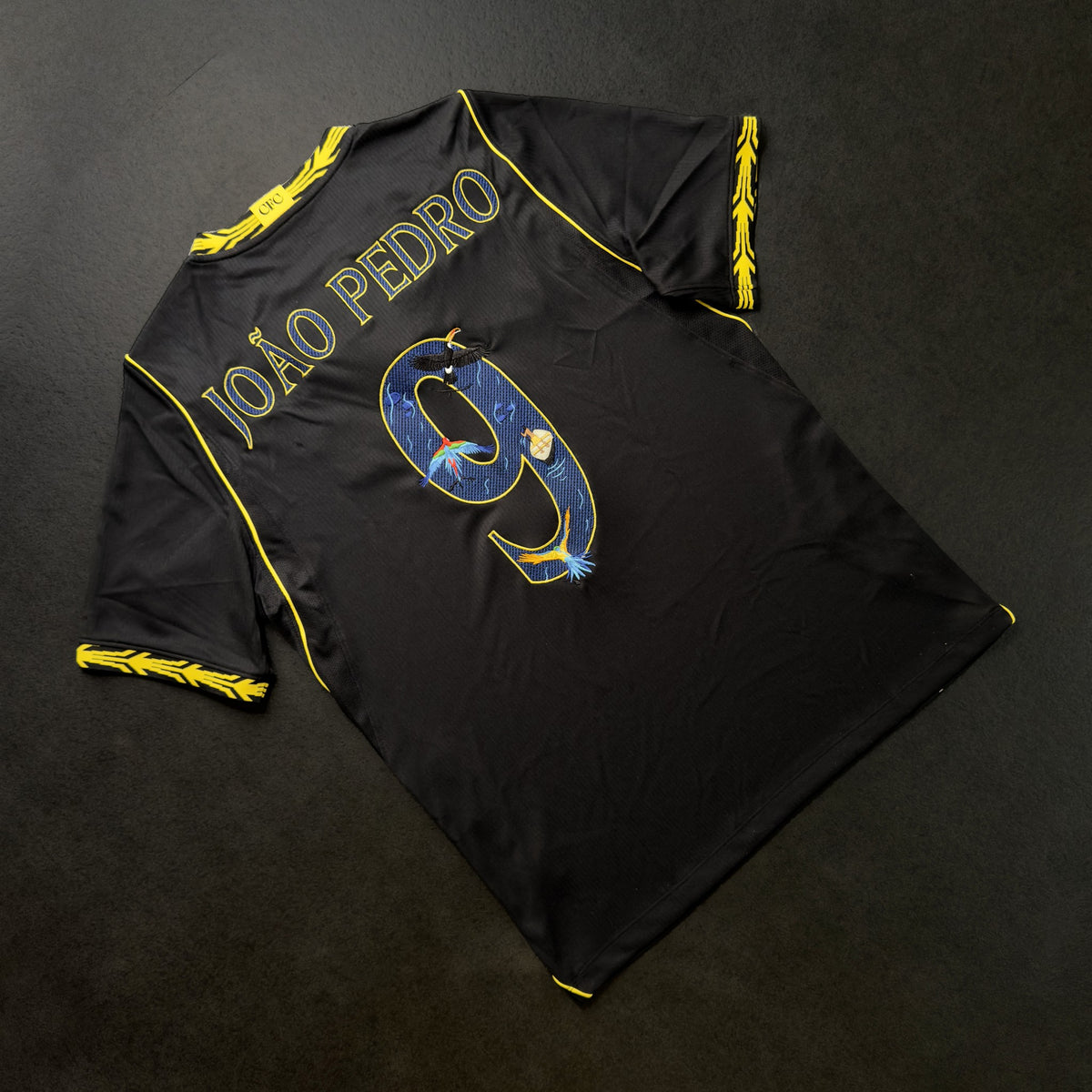 Chelsea 26/27 away jersey with João Pedro's 9 and nameset embroidered in navy and yellow, back view