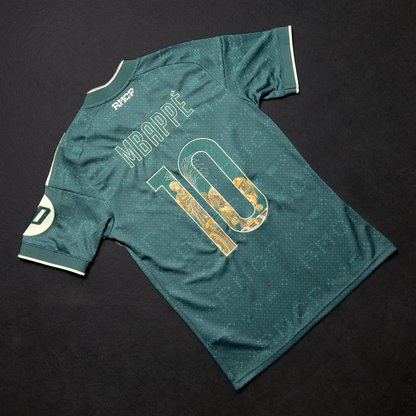 Back of the green Real Madrid away jersey with Mbappé and the number 10 embroidered with the Cibeles Fountain in stone and gold