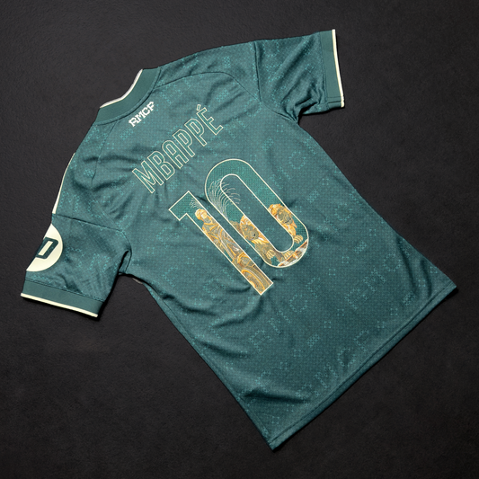 Back of the green Real Madrid away jersey with Mbappé and the number 10 embroidered with the Cibeles Fountain in stone and gold