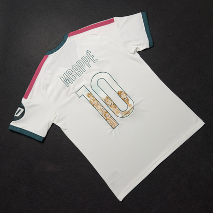 Back of the white Real Madrid home jersey with Mbappé and the number 10 embroidered with the Cibeles Fountain in stone and gold